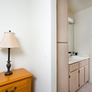 Model unit bathroom hall decorated in a modern style