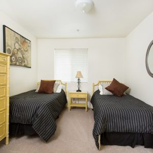 Model Unit bedroom. Furnished in a modern style with an individual size bed.